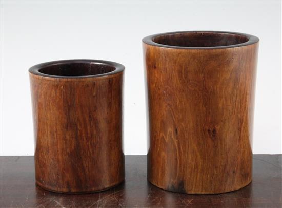 Two Chinese graduated huang huali brush pots, 18th century, 12.5cm and 15.2cm